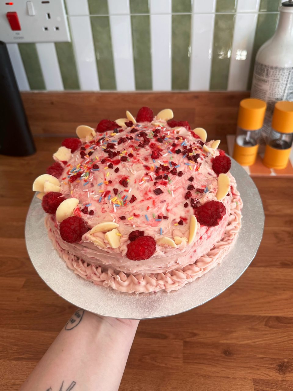 Raspberry celebration cake by Happy Belly Bakes